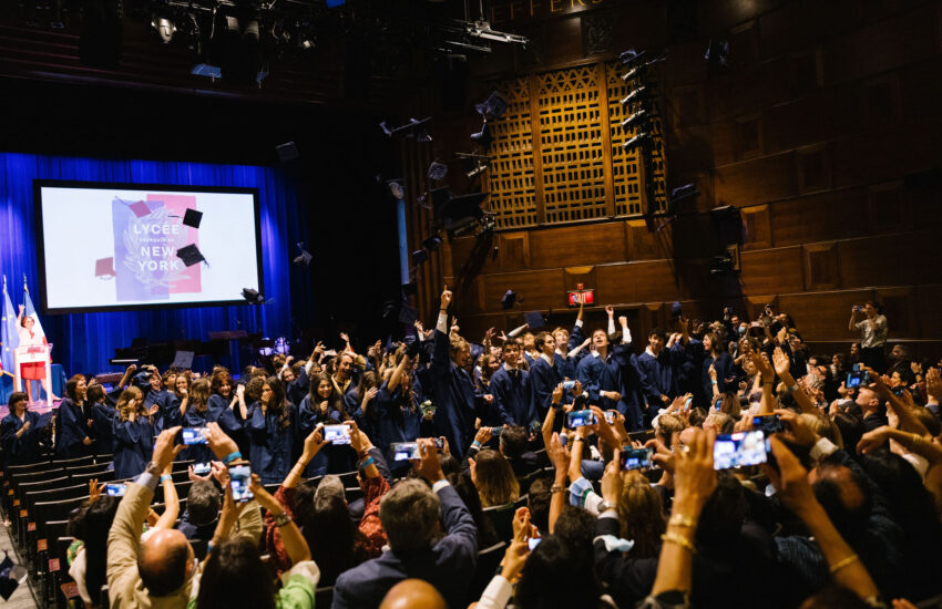 Students toss their caps at Senior Graduation 2022 at 92Y in New York City